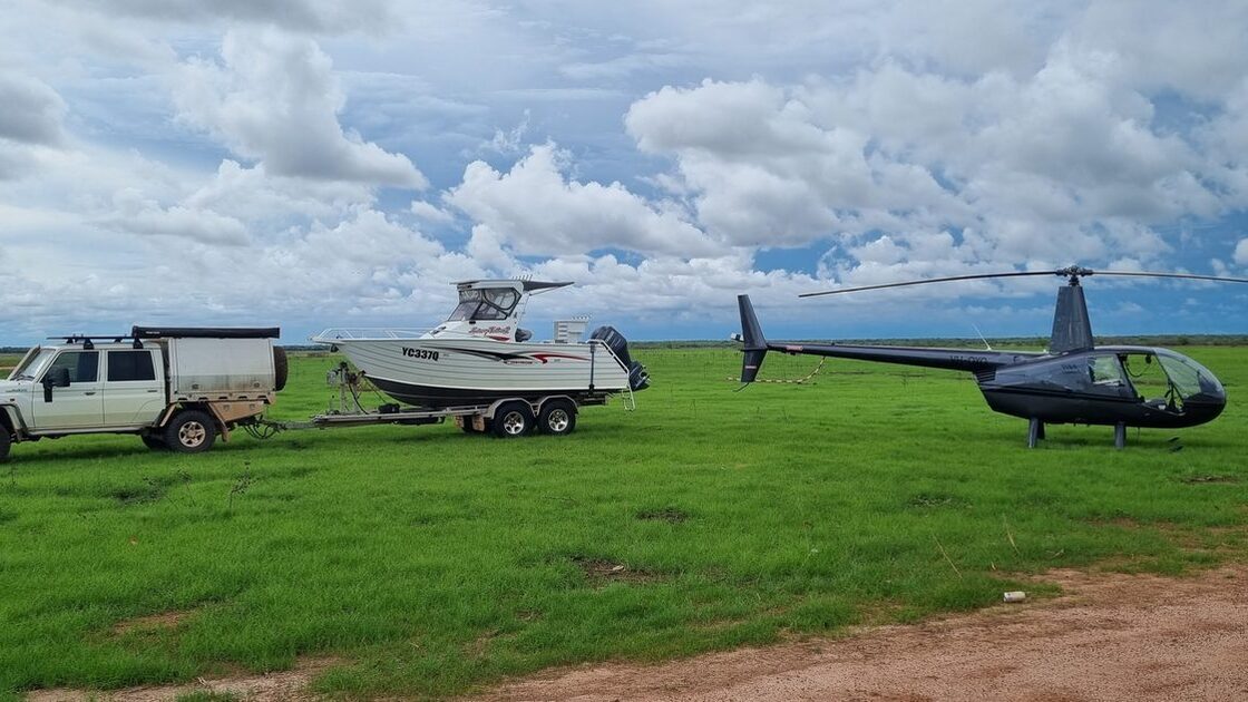 Boat and helicopter at Marina Plains — the Cape York Circuit launch point