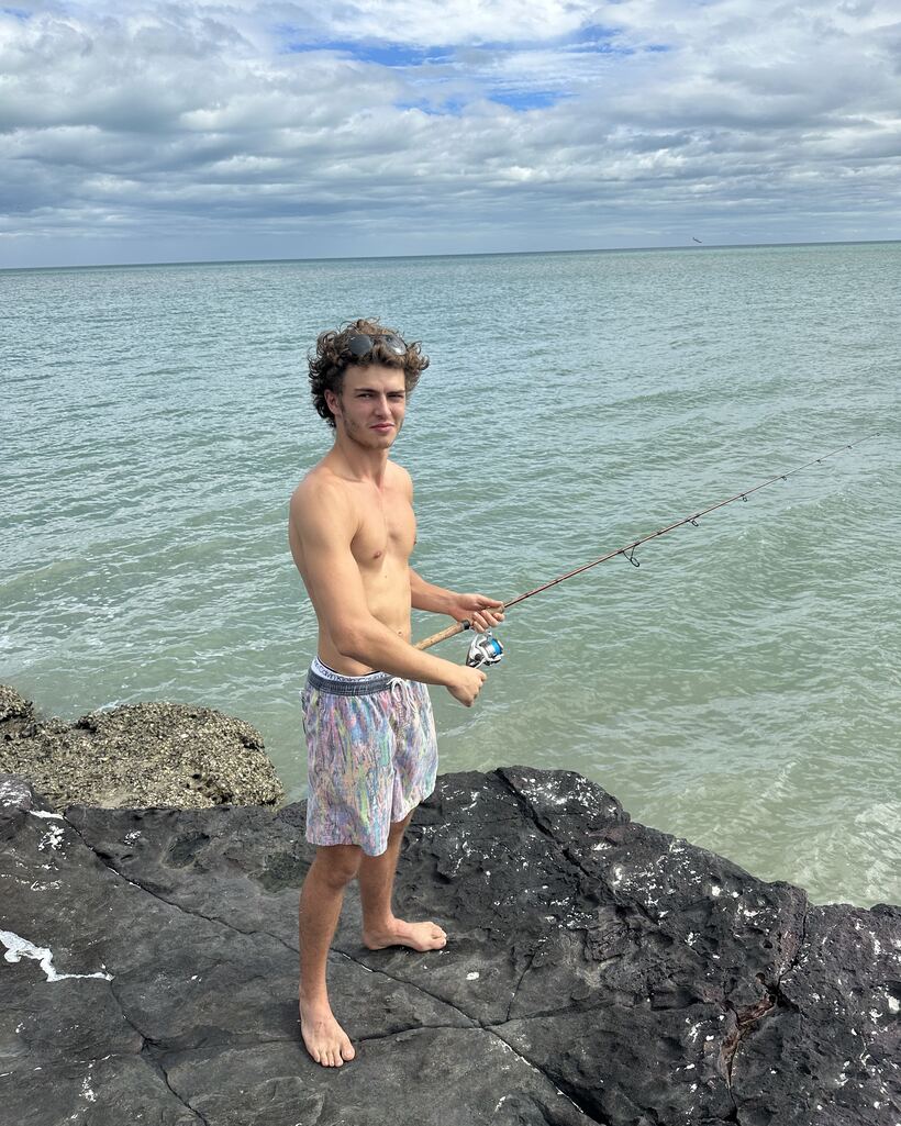 Fishing off the rocks into clear Cape York water